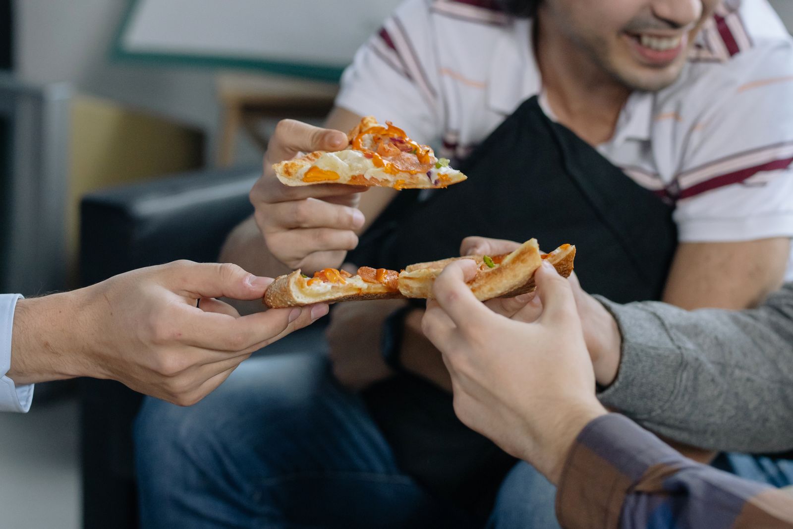 Satisfied customer enjoying quality wood fired pizza experience